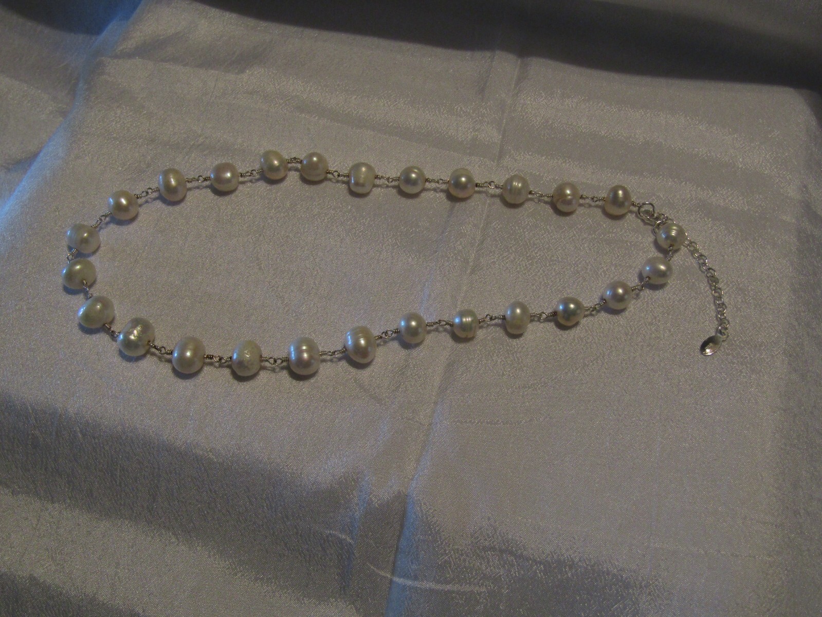 925 Silver and 7mm – 9mm White Baroque Freshwater Pearls 16in – 18in length