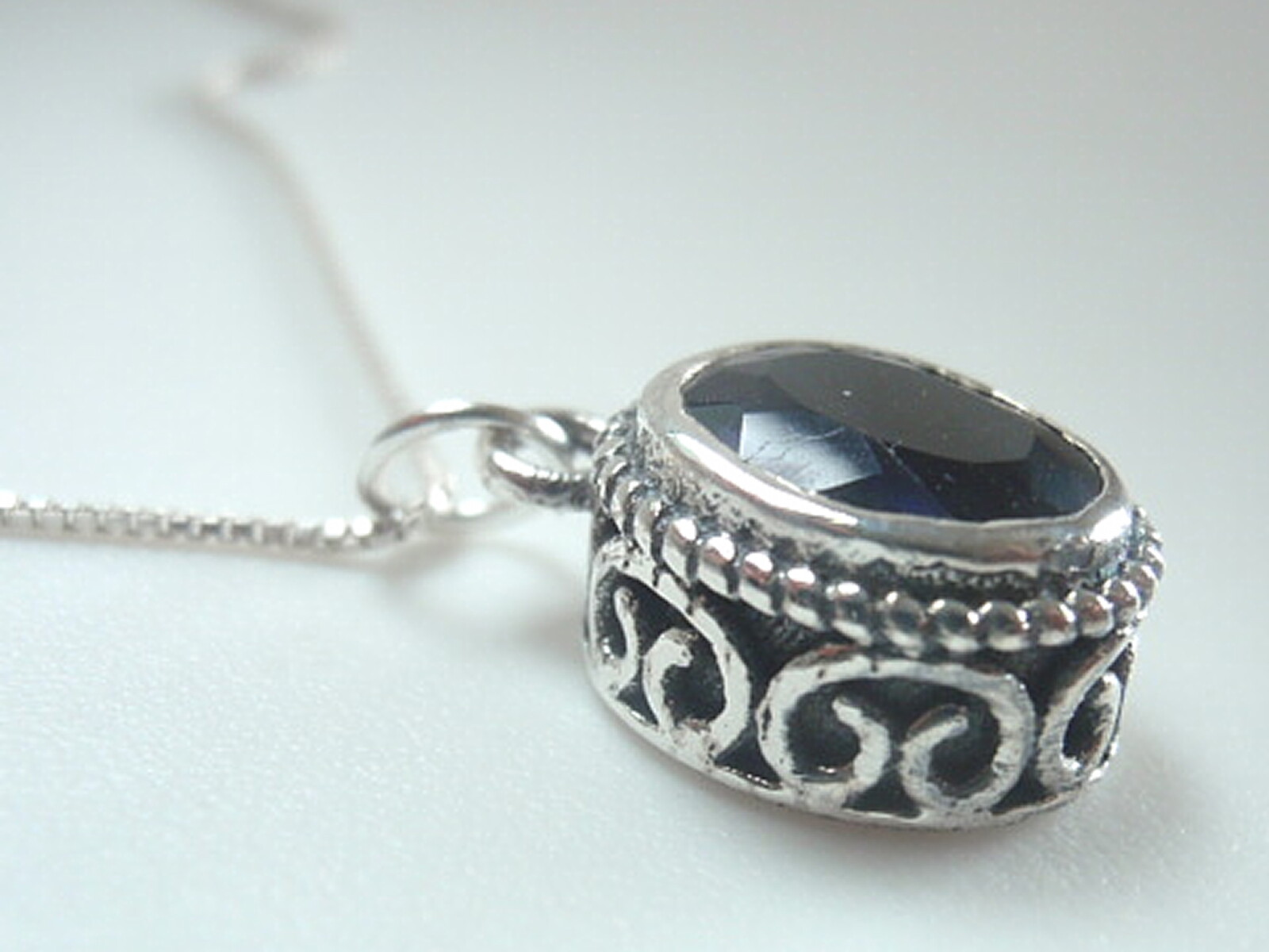 Faceted Iolite 925 Sterling Silver Pendant with Side Tribal Markings